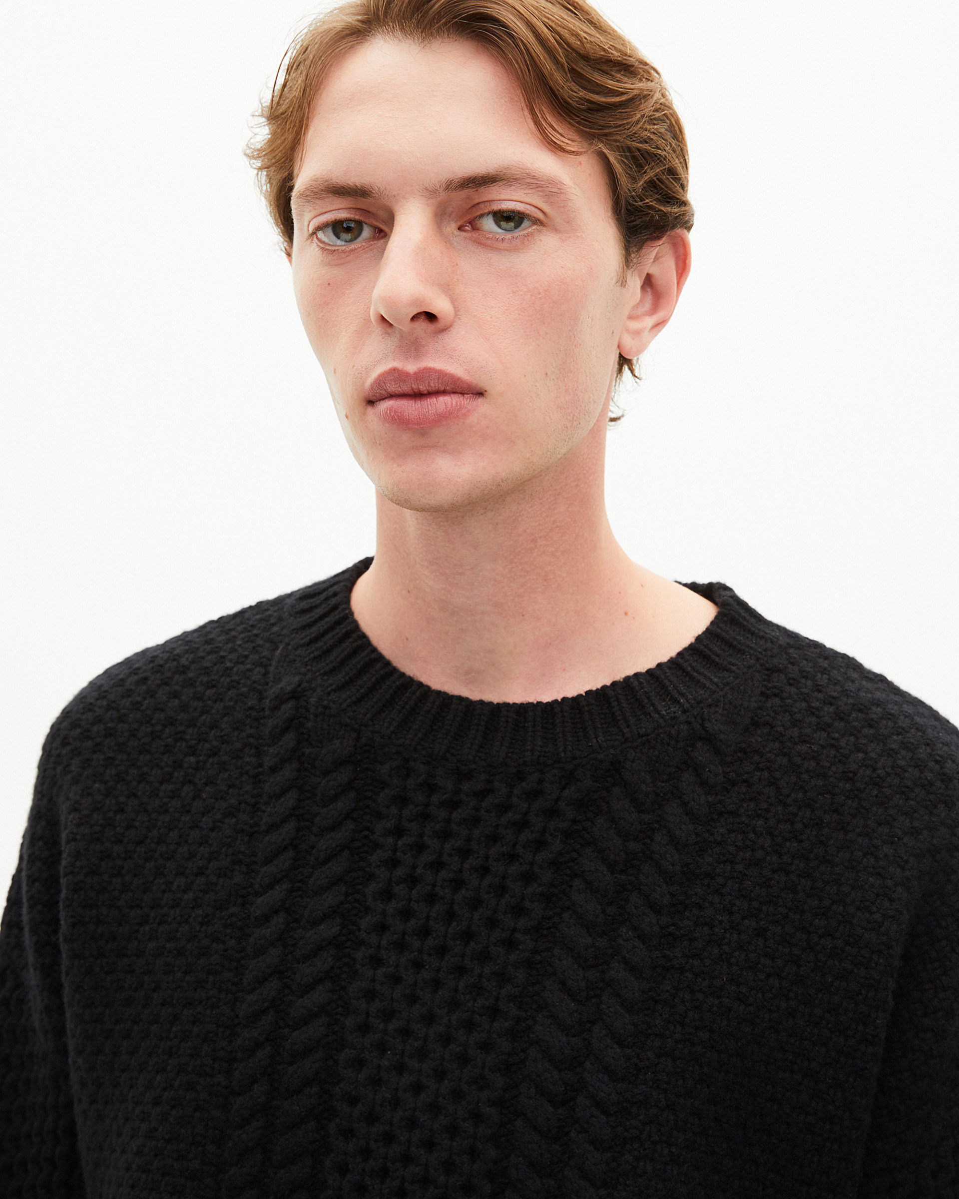 Pull torsadé en laine noir