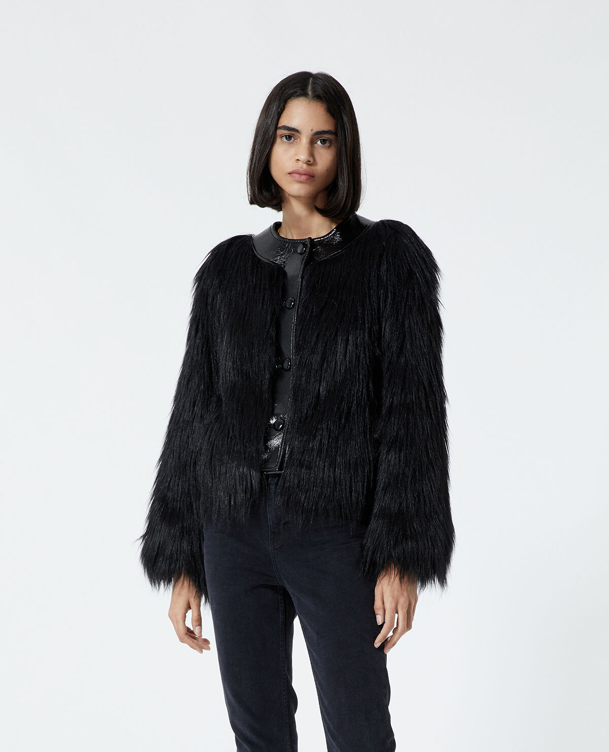 Black faux fur coat with patent detail The Kooples