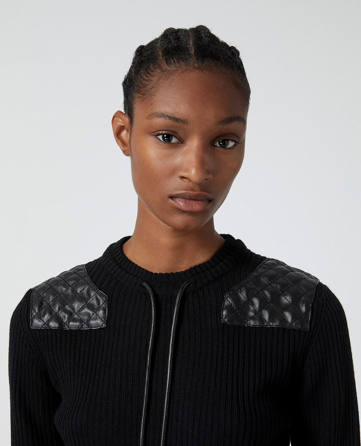 Black sweater with outlet leather trim