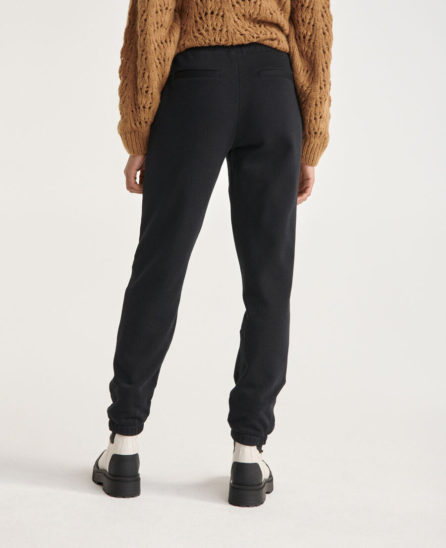 black joggers with small the kooples logo