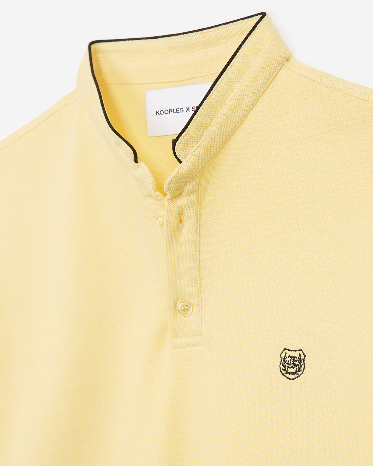 The Kooples H WHEAT YELLOW / BLACK embroidered yellow polo shirt with stand-up collar