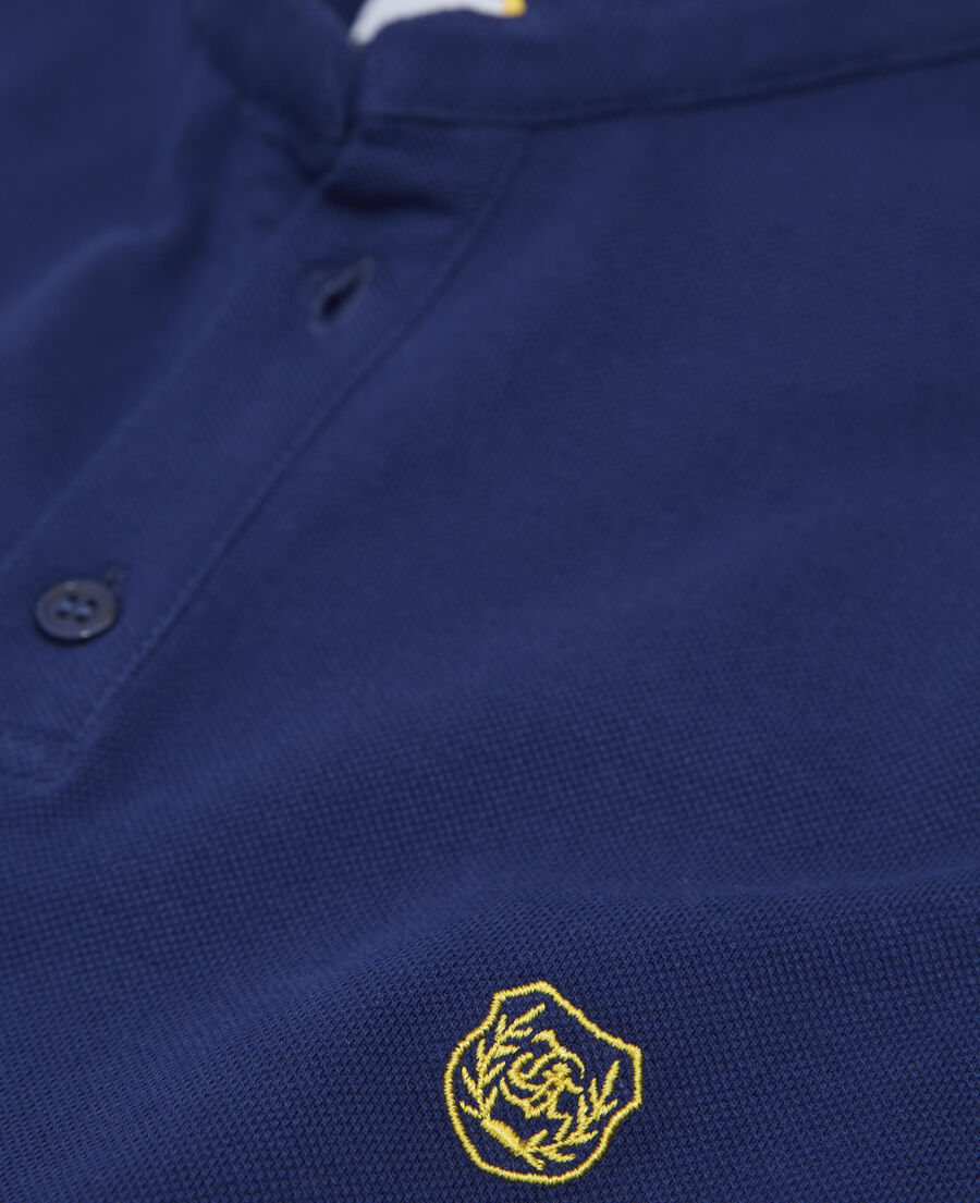 navy blue jersey polo with yellow details