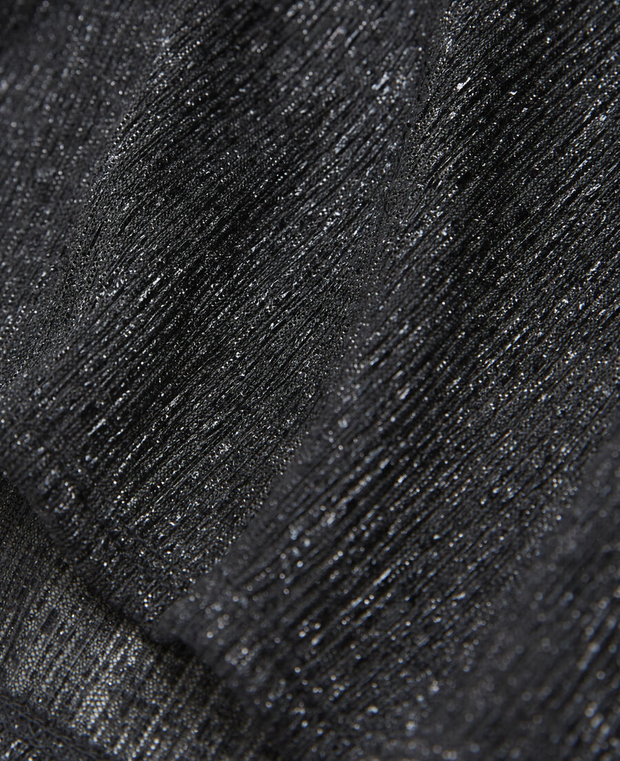 flowing black top with puffed sleeves
