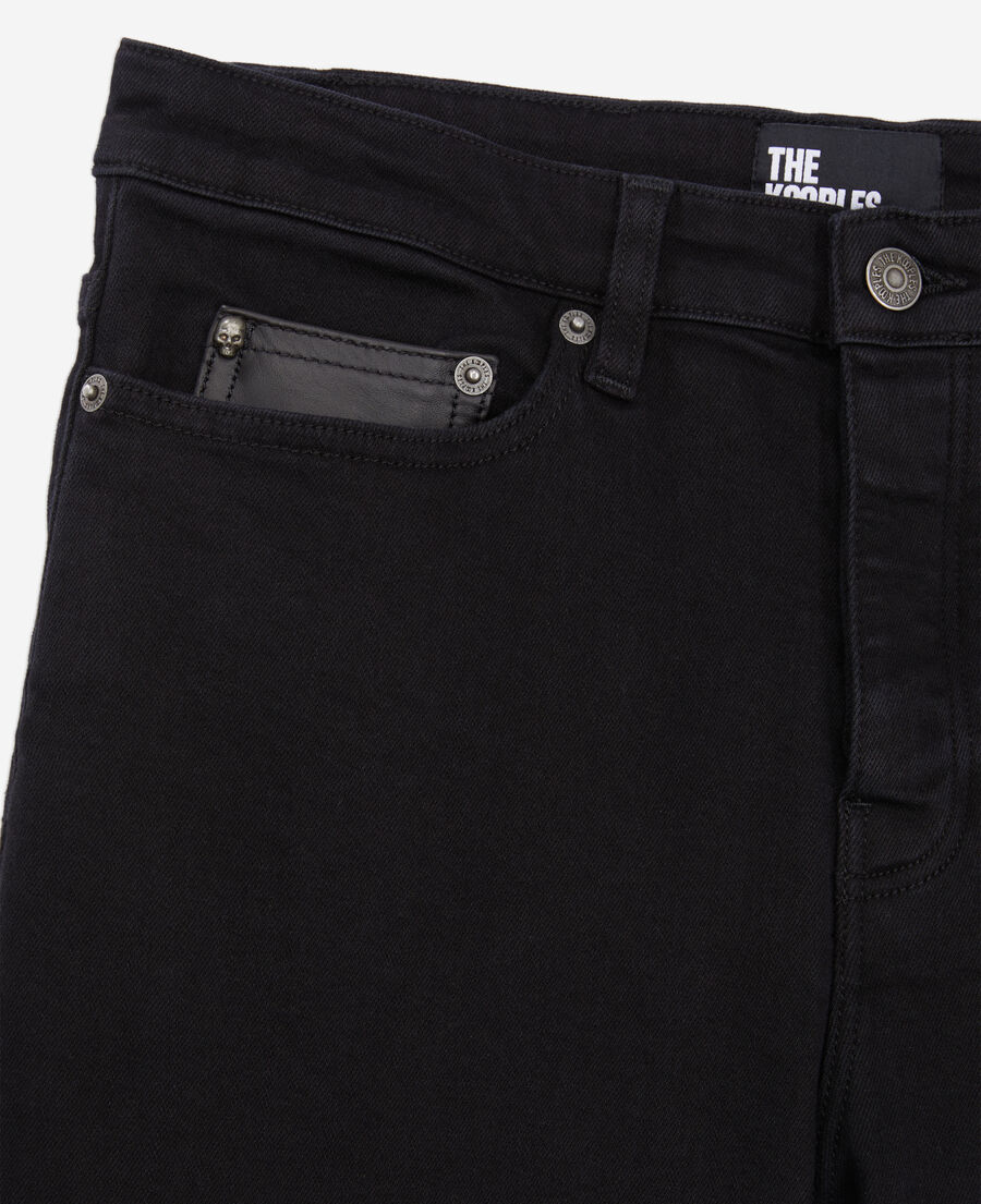 schwarze slim-jeans mit tasche aus leder