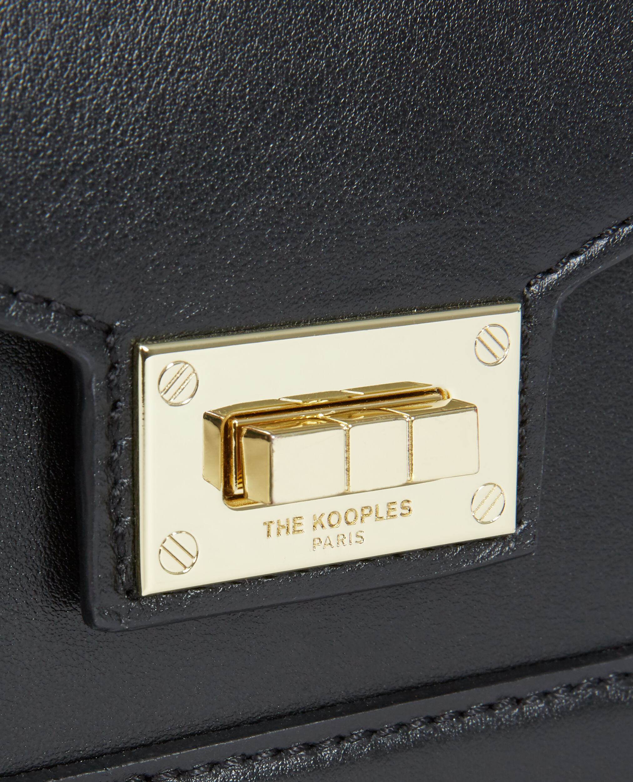 Small black leather handbag with gold details The Kooples US