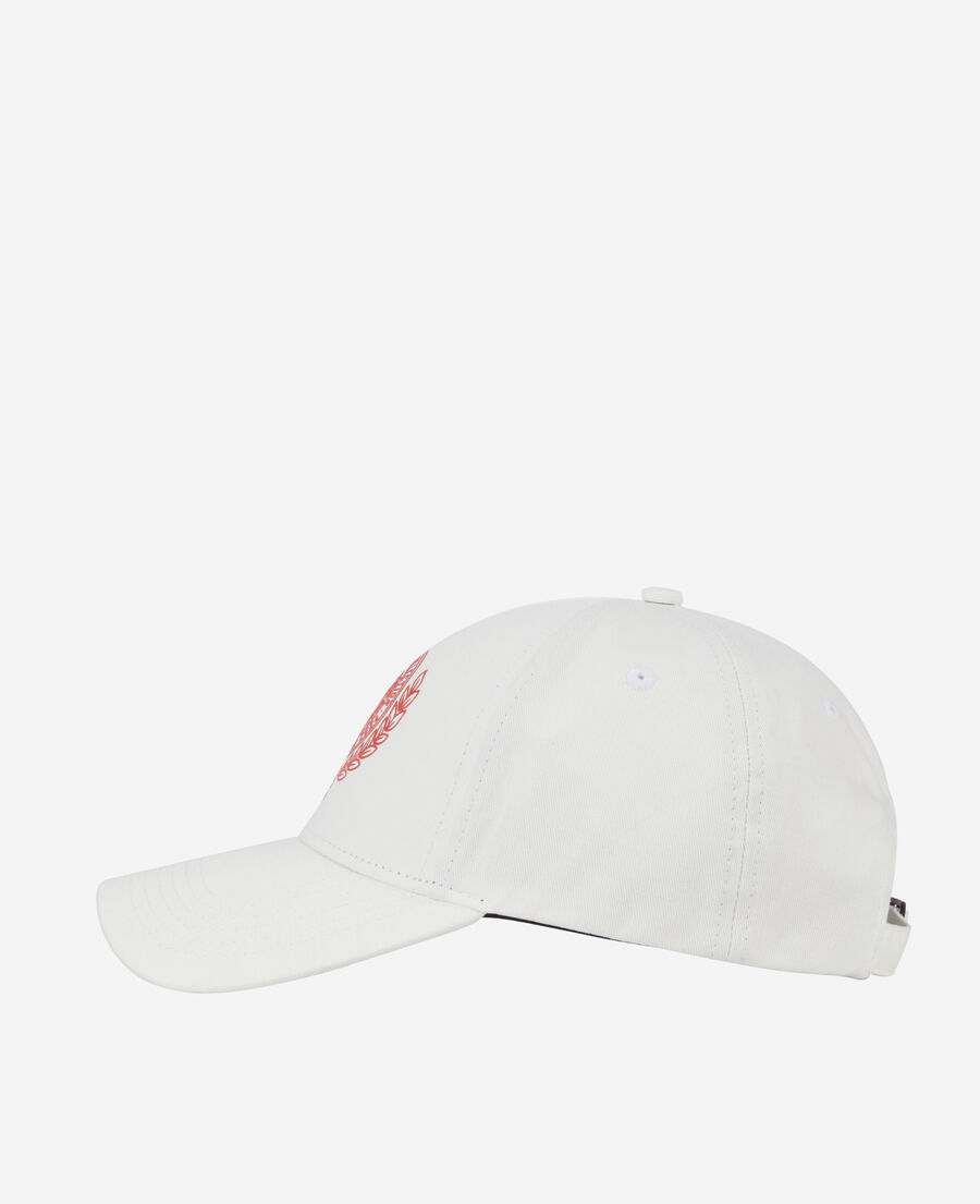 white cap with blazon