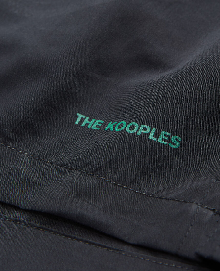 schwarze badehose mit the kooples-logo