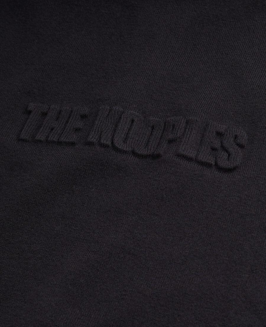 black sweater with debossed logo