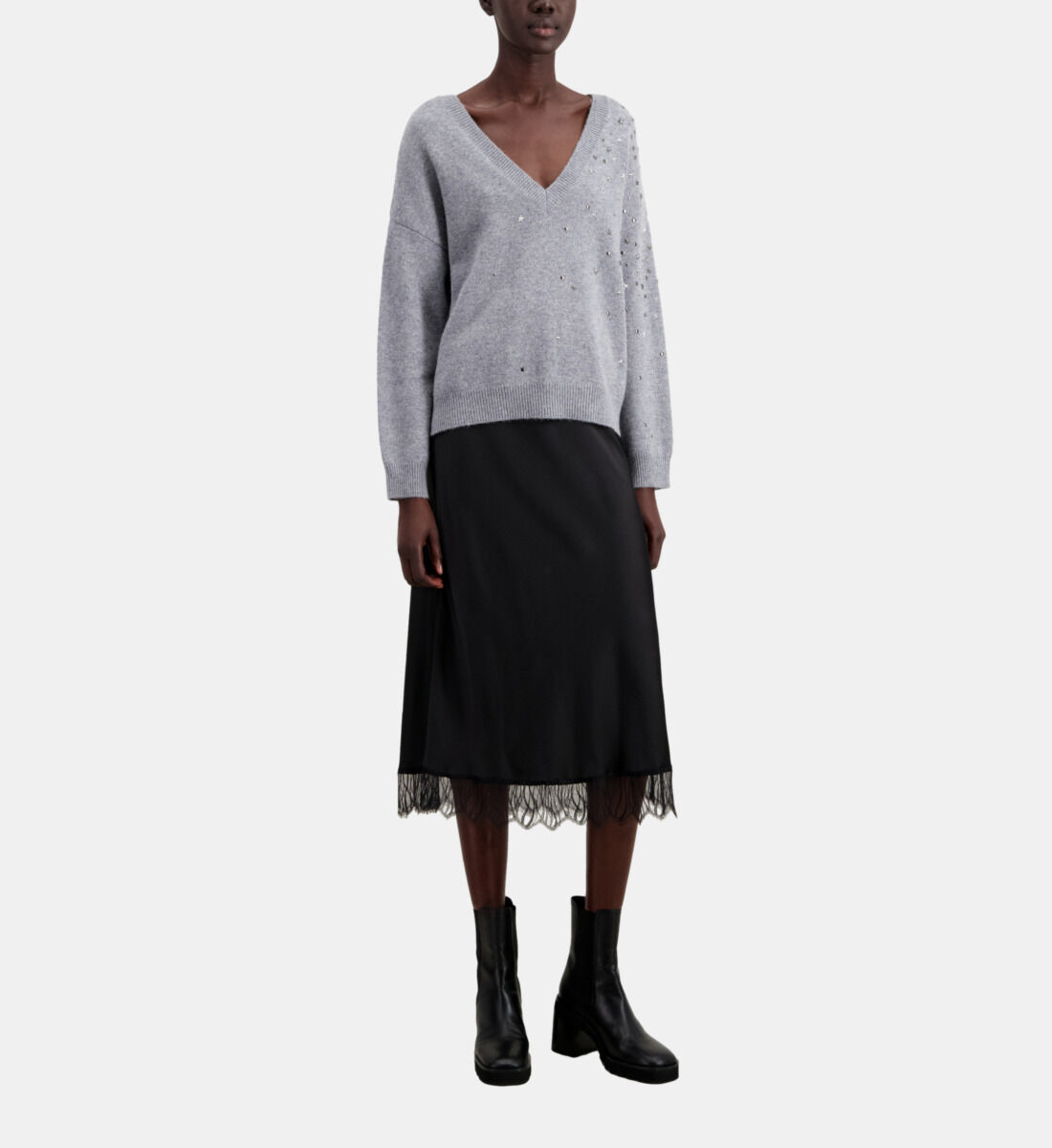 Grey sweater with black stars discount