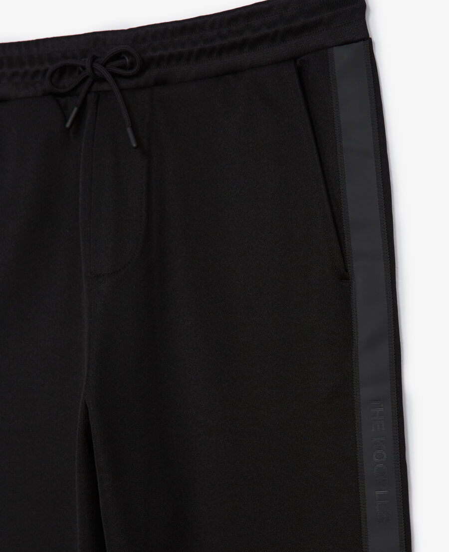black joggers in cotton with logo band