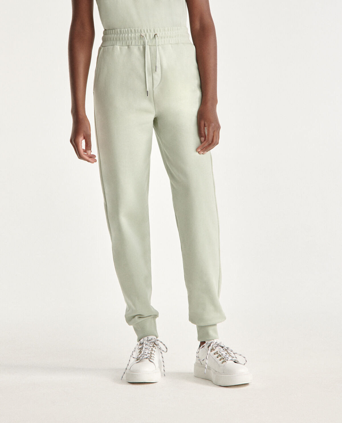 Green and white best sale joggers