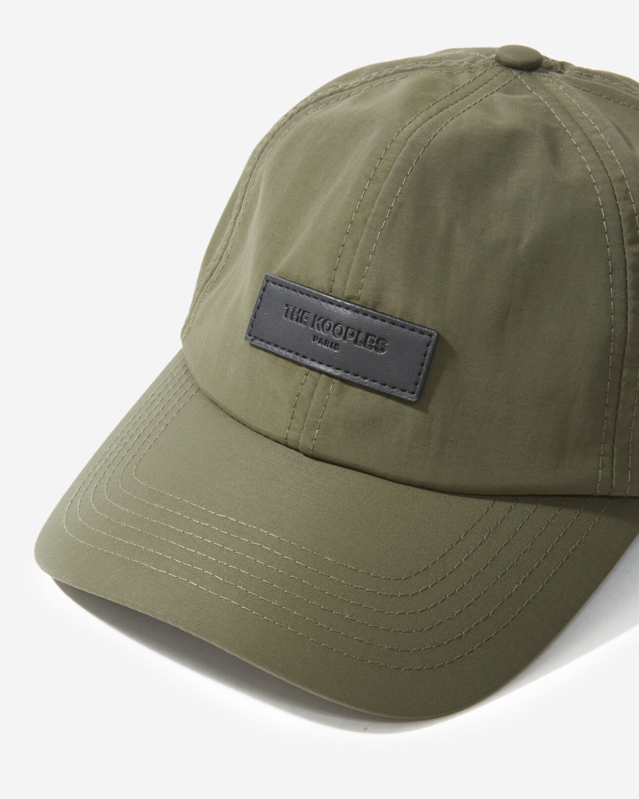 The Kooples MIXED KAKI khaki nylon cap with black leather badge