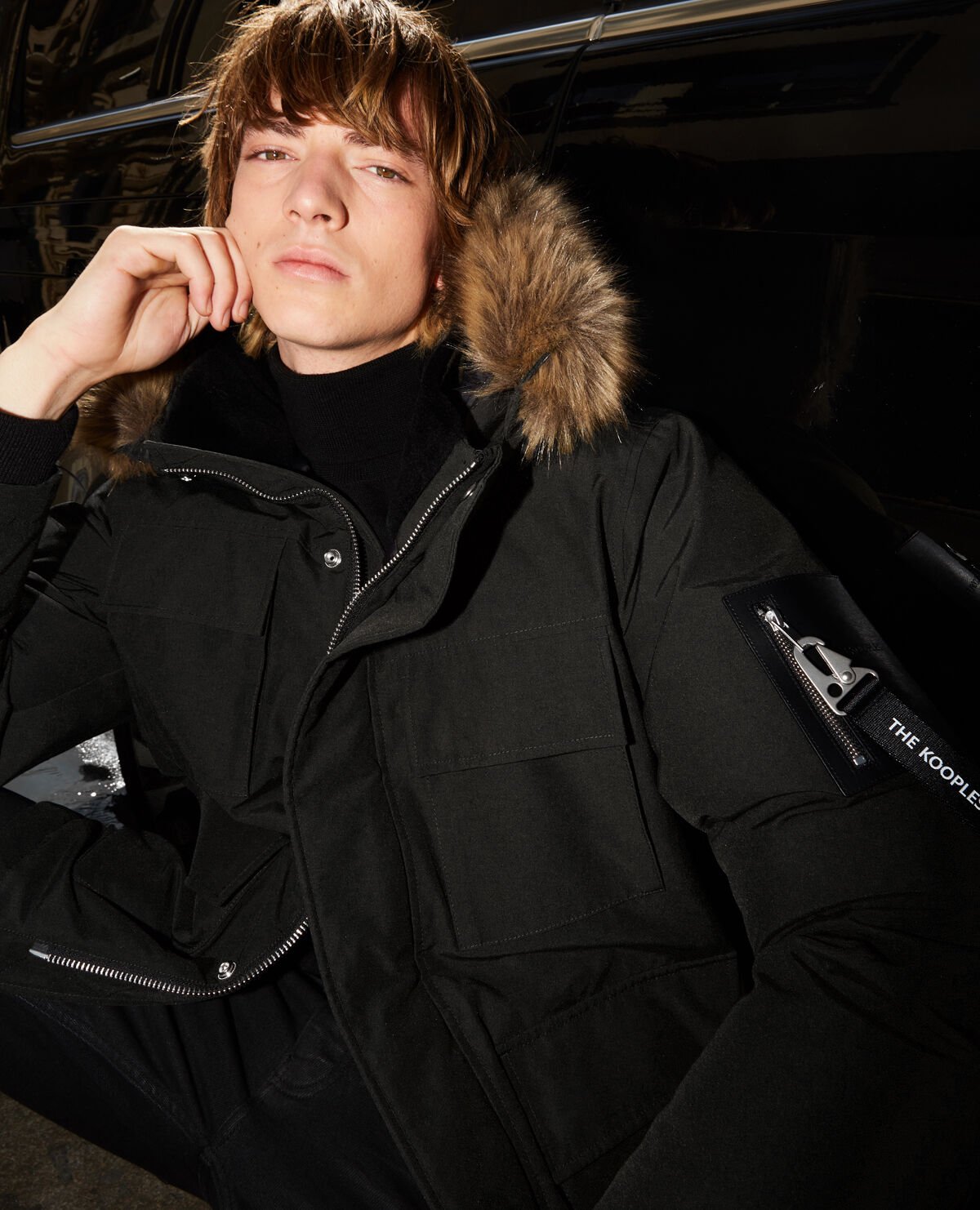 The kooples parka deals with fur hood