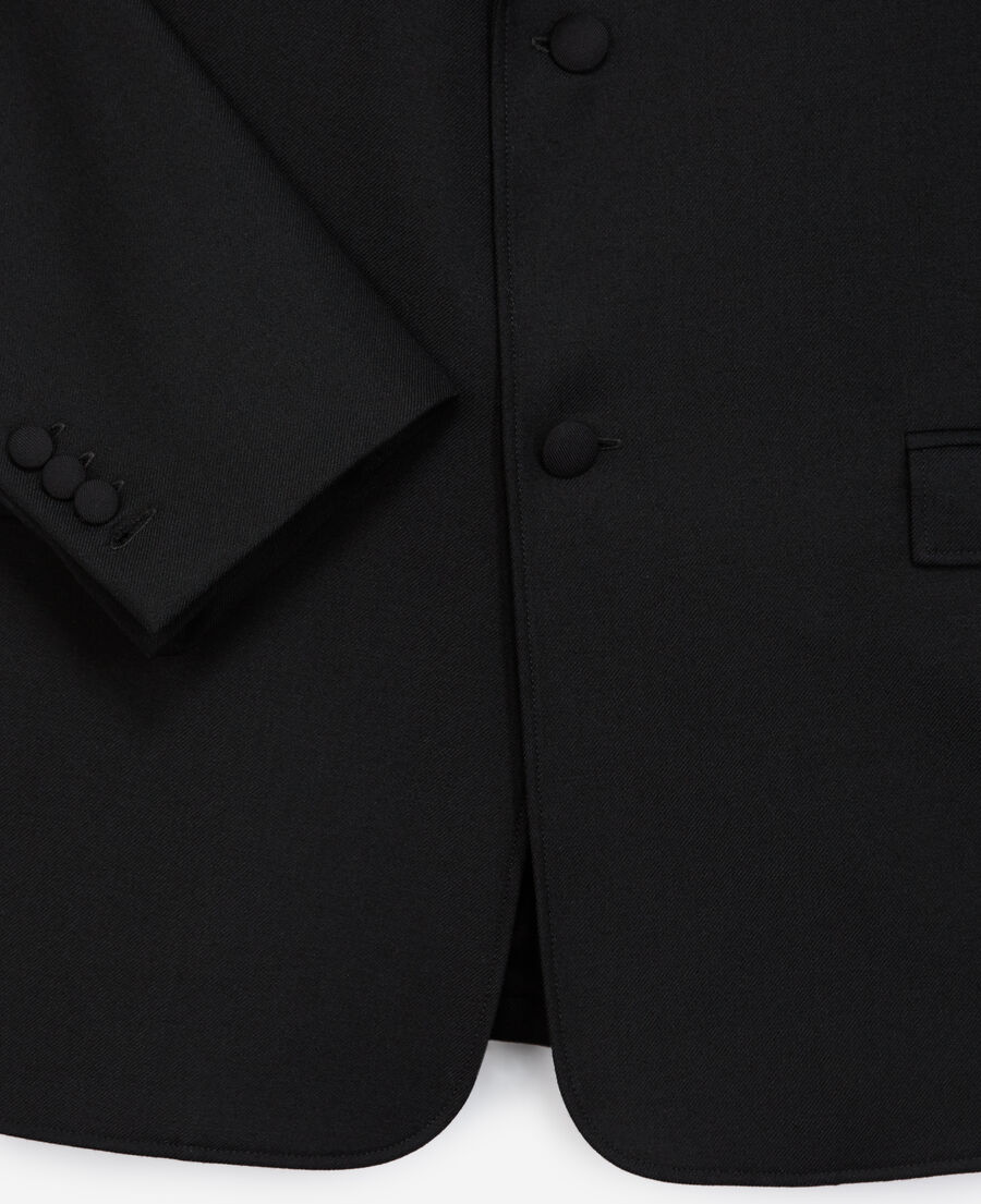 black jacket with covered buttons