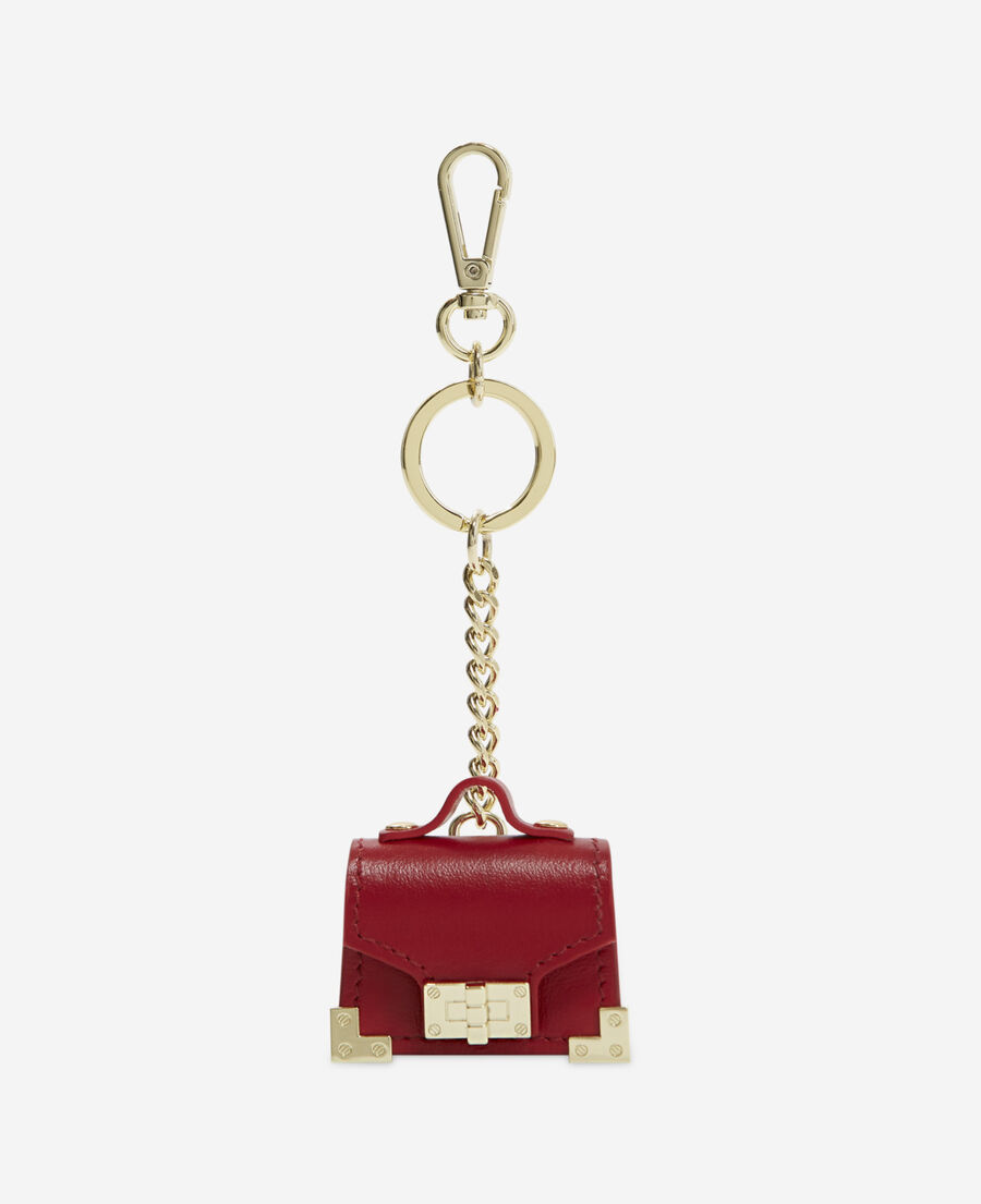 goldener emily-schlüsselanhänger mit roter minitasche