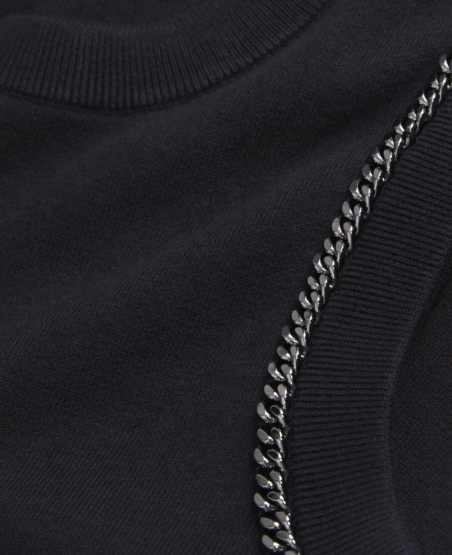 schwarzer pullover aus strick mit ketten
