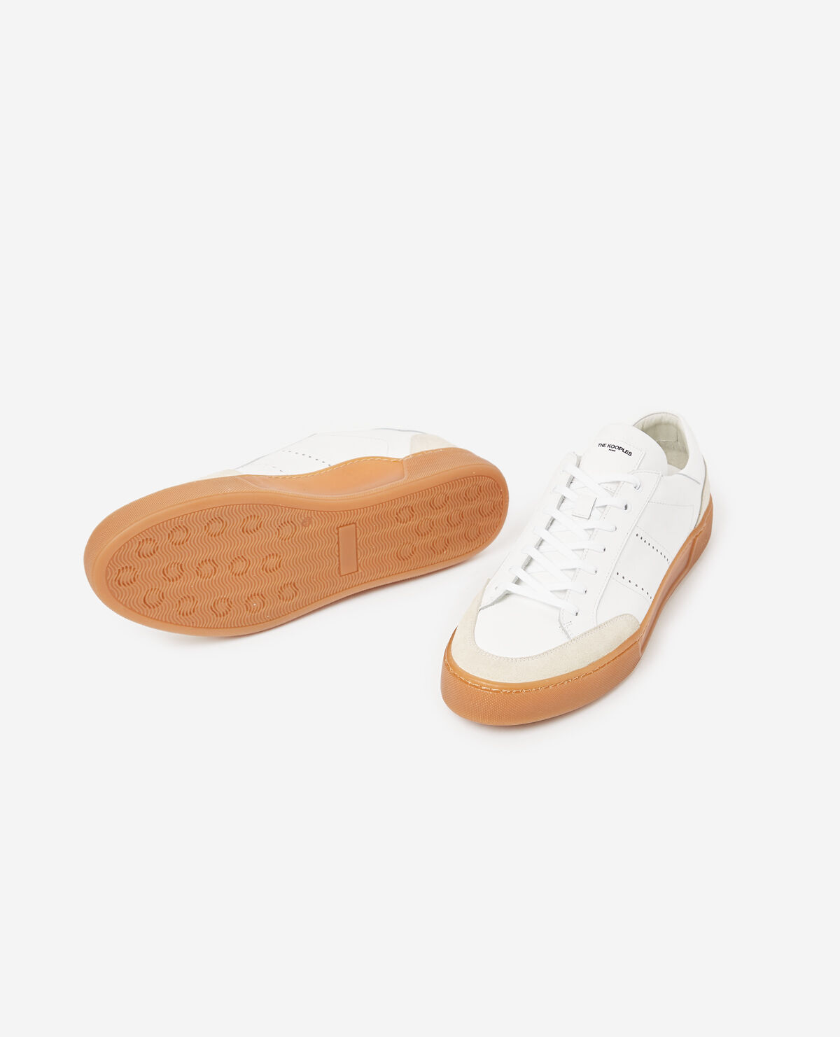 White low top leather trainers with rubber soles