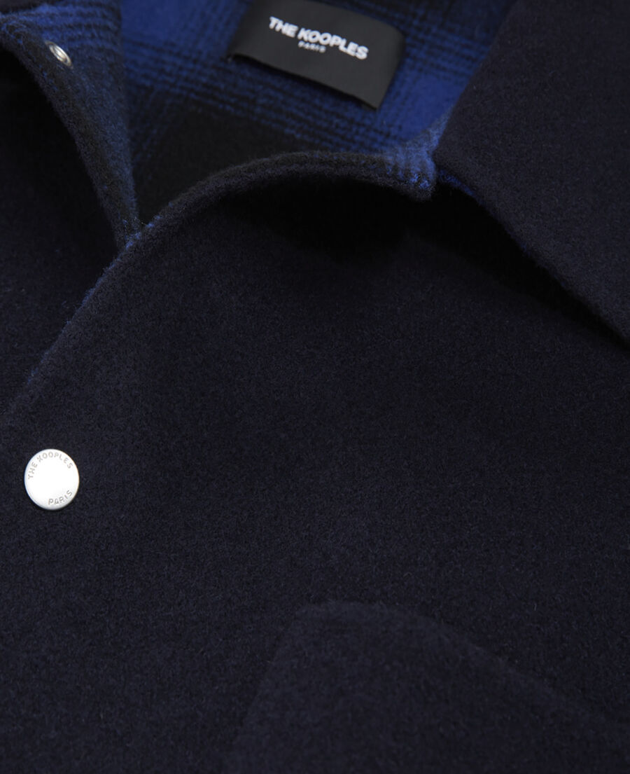 chaqueta azul marino lana bolsillos en pecho