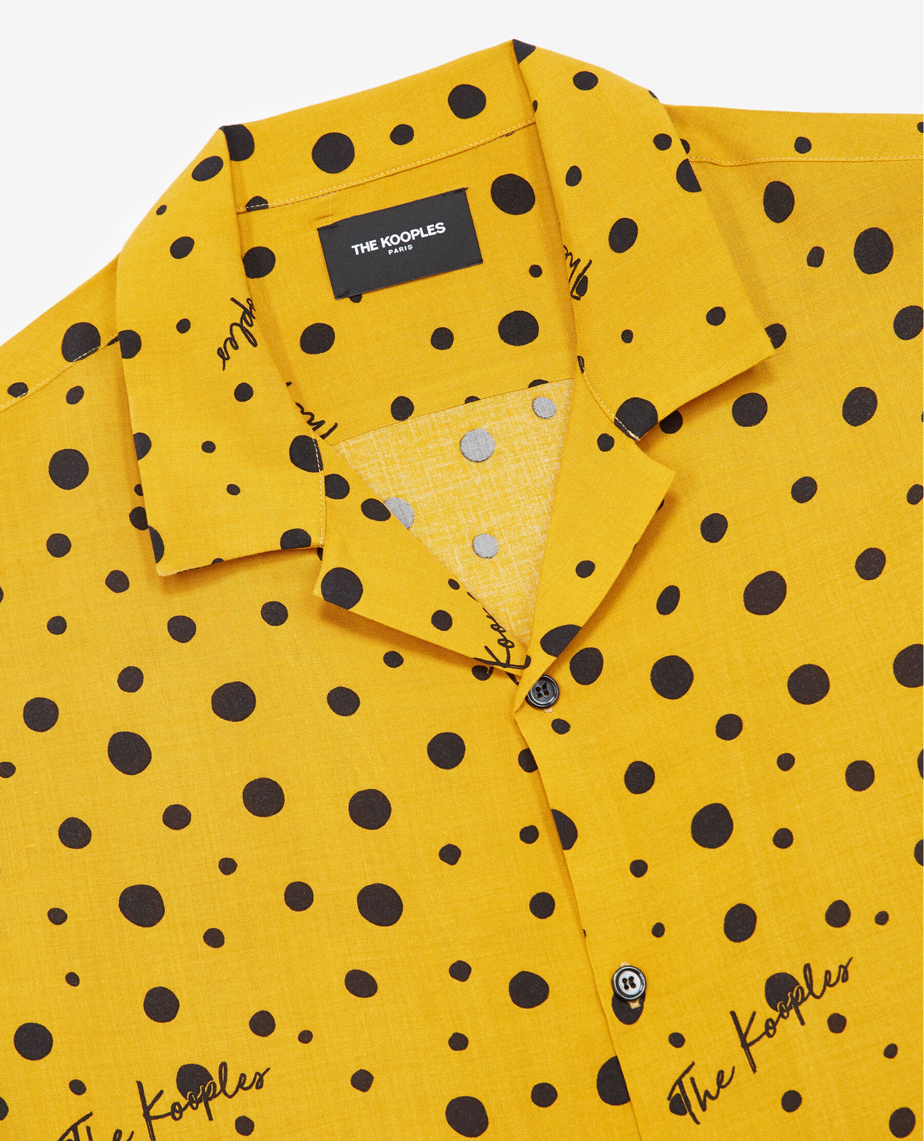 Yellow shirt with black best sale polka dots