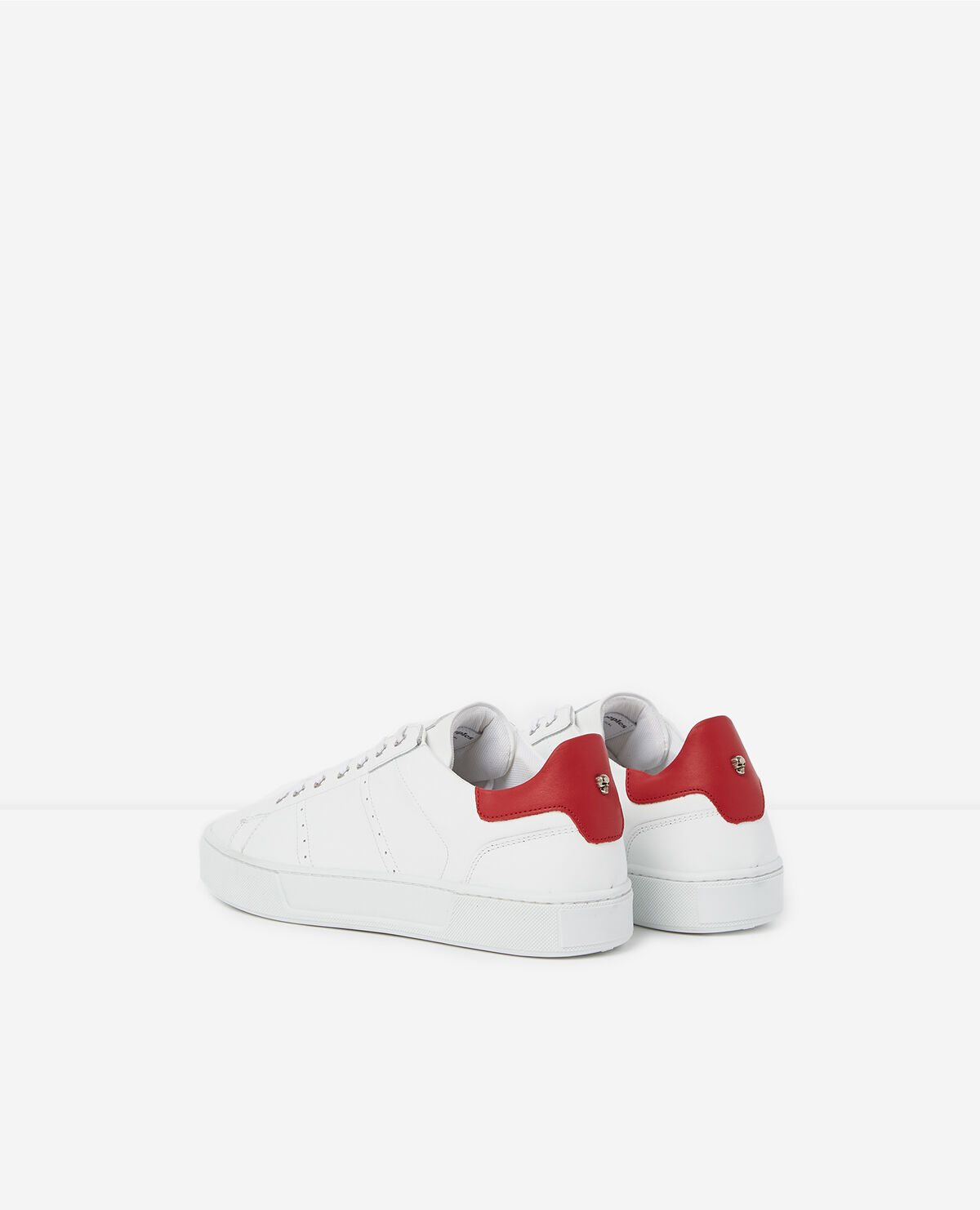 White Sneakers with Red Accent