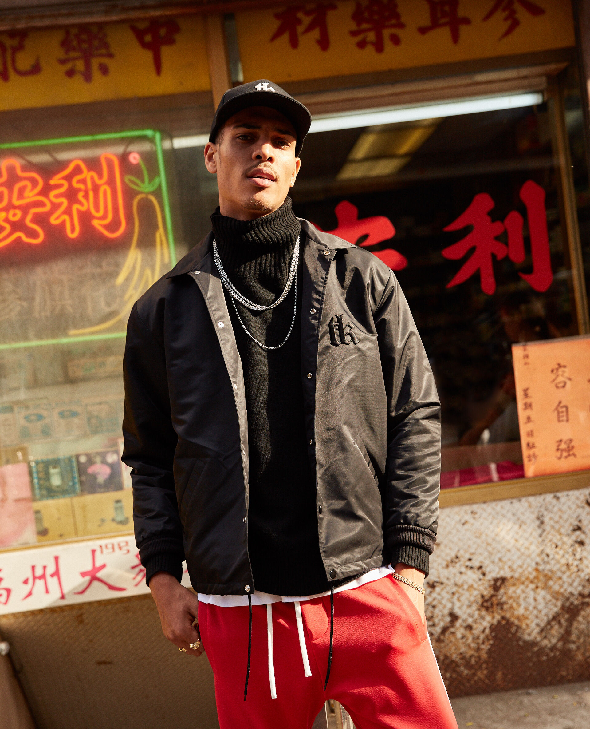 Black satin jacket with embroidered The Kooples Sport logo