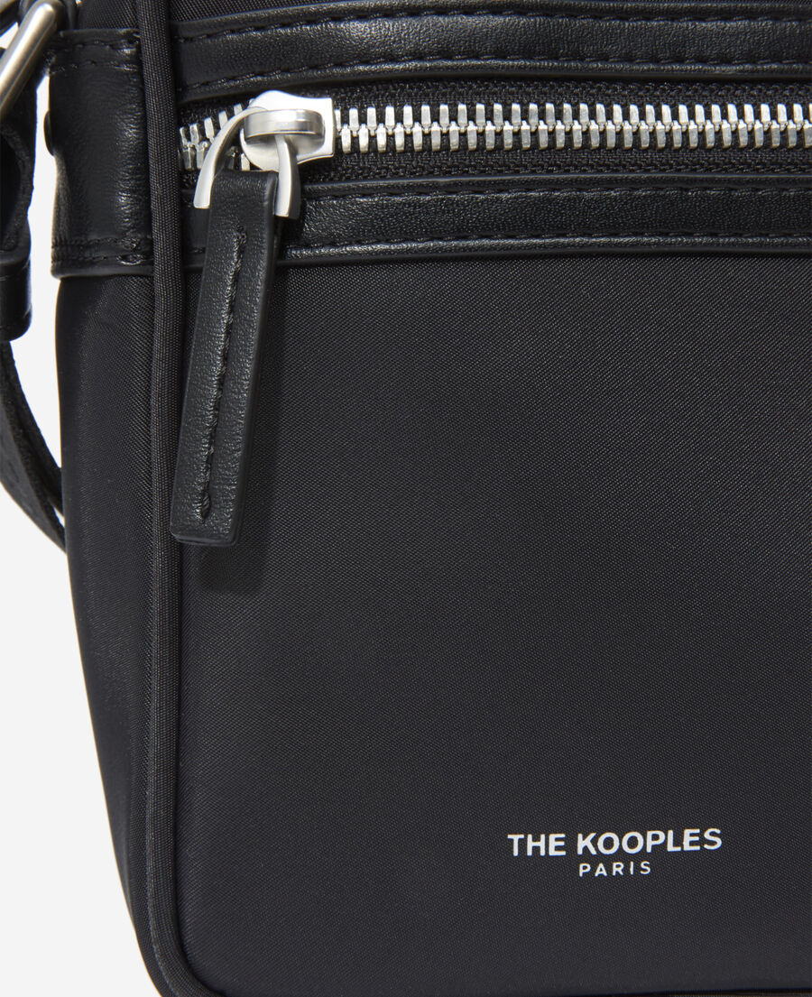 black nylon bag with zipped pockets