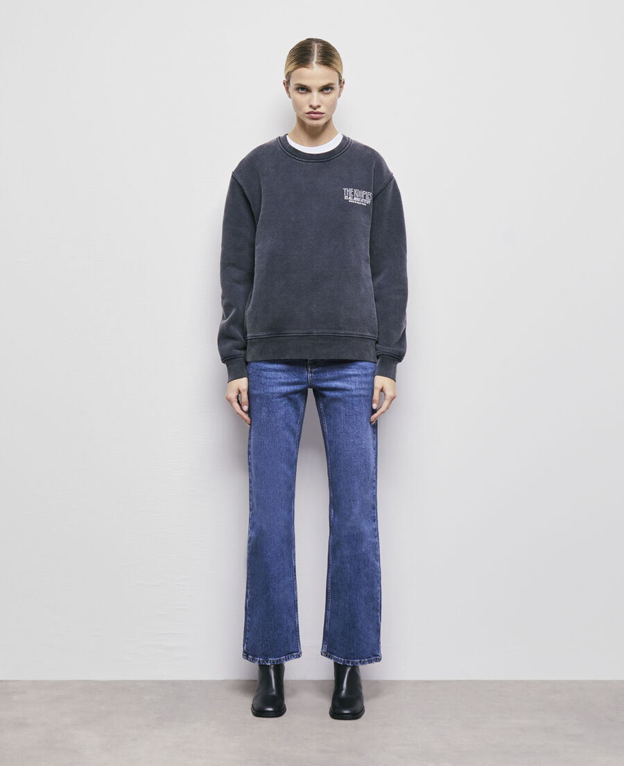 black sweatshirt with skull screen print