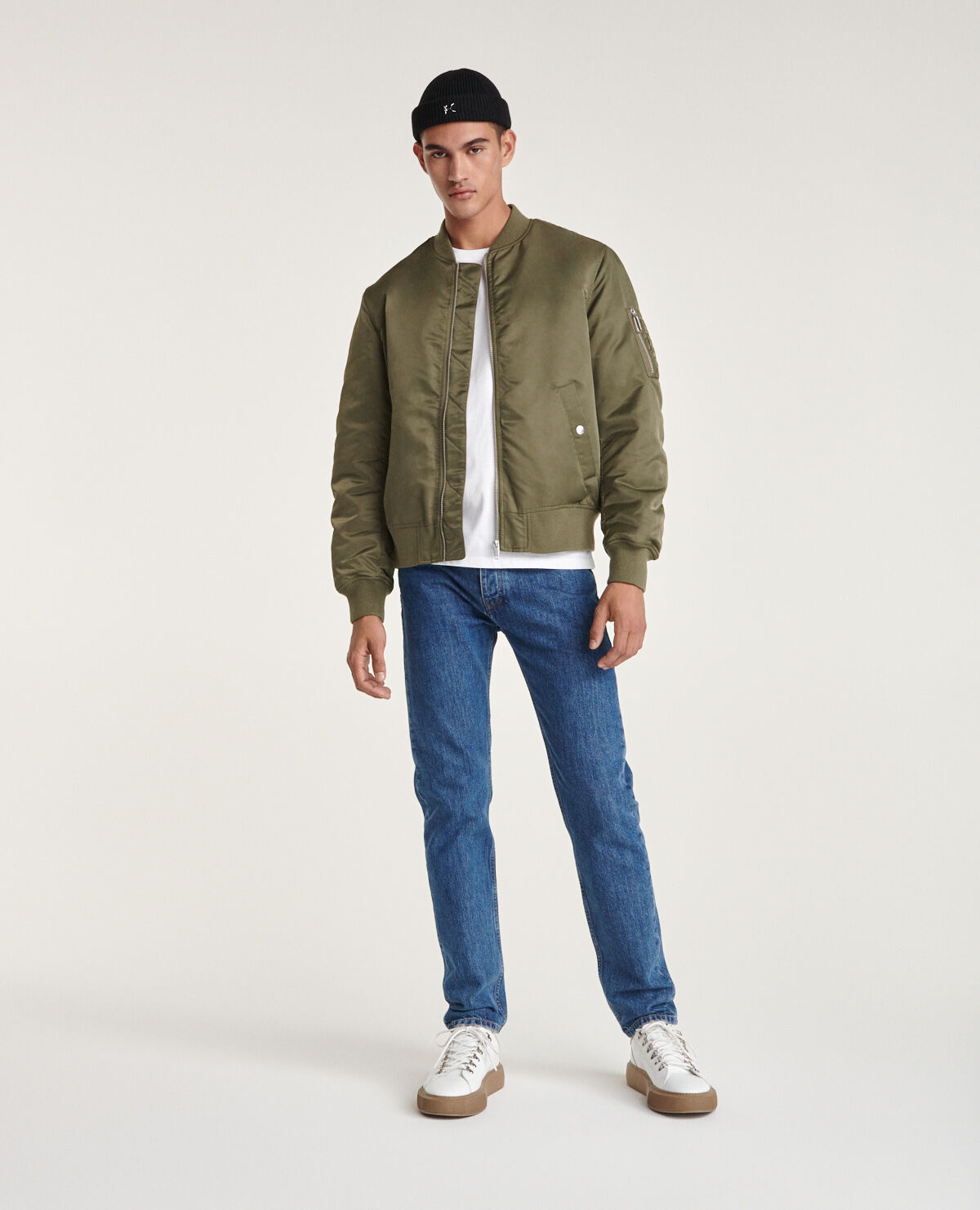 Khaki bomber jacket with orange lining