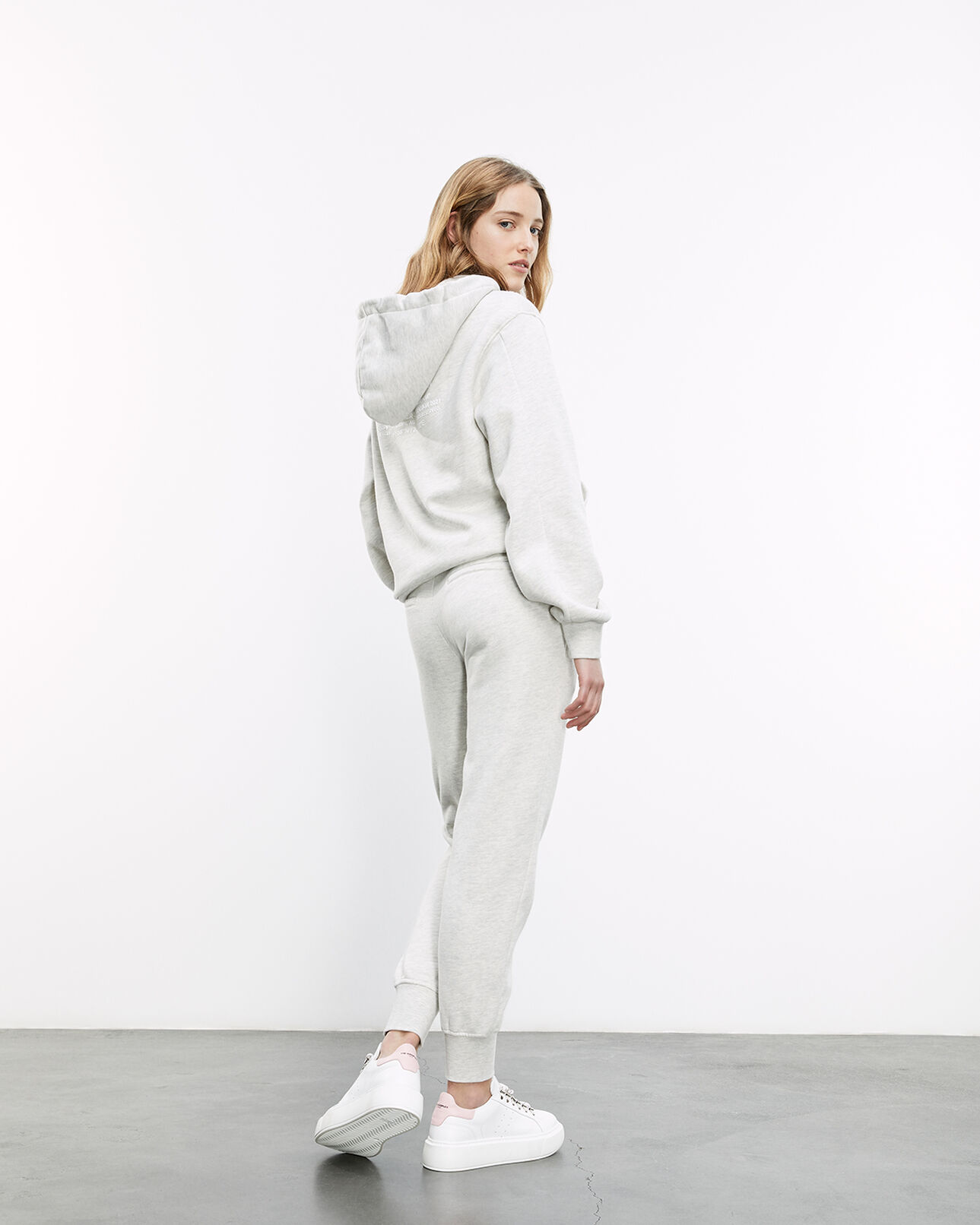 The Kooples WOMEN LIGHT GREY MELANGE gray joggers with rubber logo