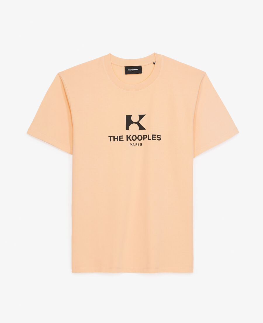 coral-orange cotton t-shirt with 'k' monogram