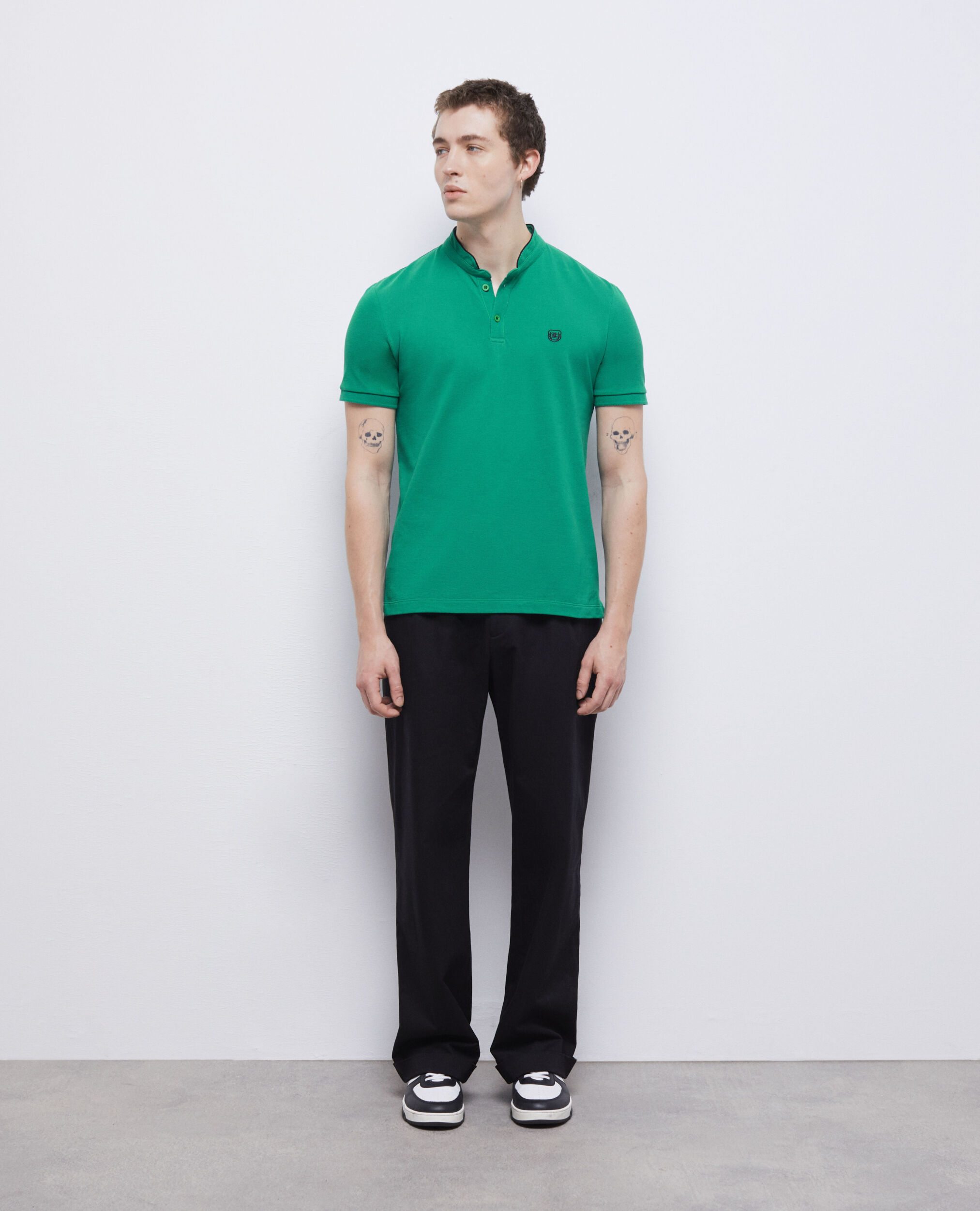 Green polo black pants store