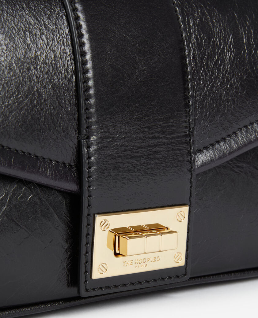 The Kooples FEMME BLACK pochette longue en cuir noir