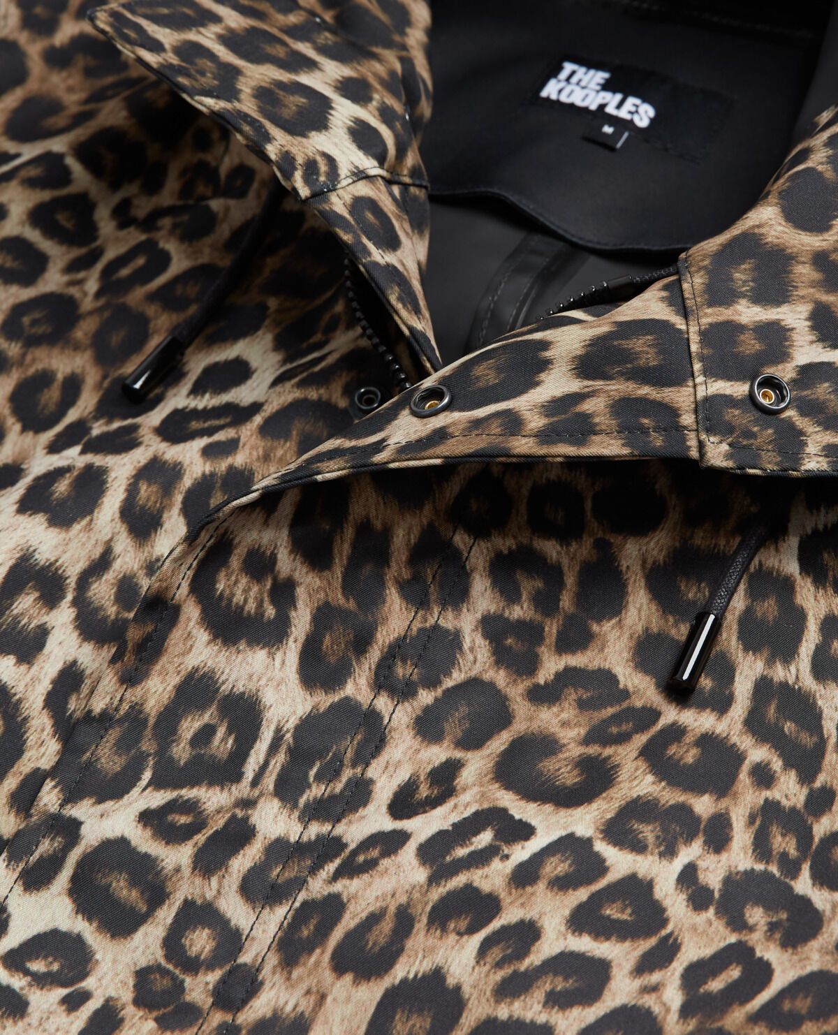 Long parka with leopard print hood
