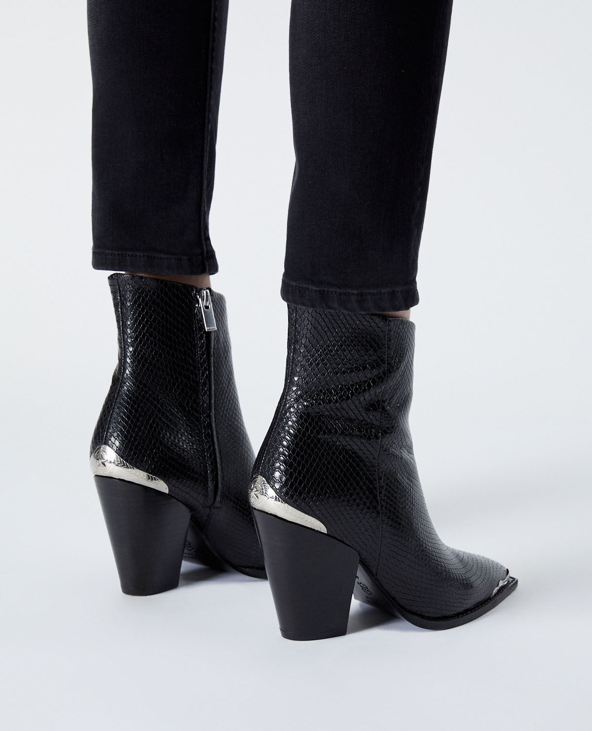Snakeskin heeled booties 2025