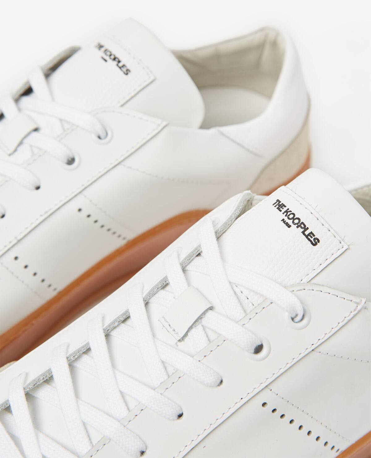 White low top leather trainers with rubber soles