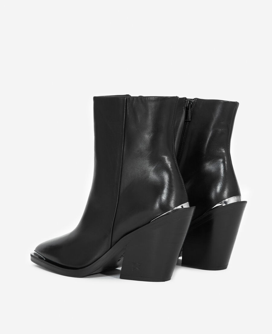 cowboy-style heeled black ankle boots