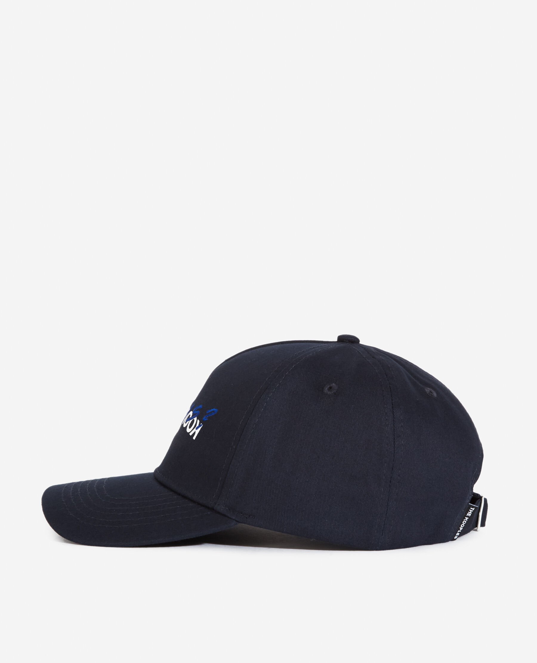 Navy blue cotton cap with embroidered “What is”