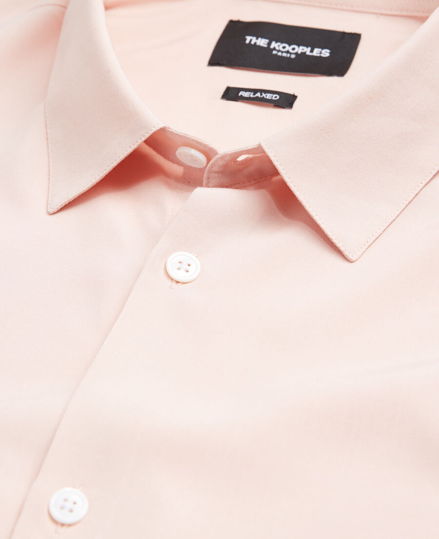 flowing light pink shirt with cuban collar