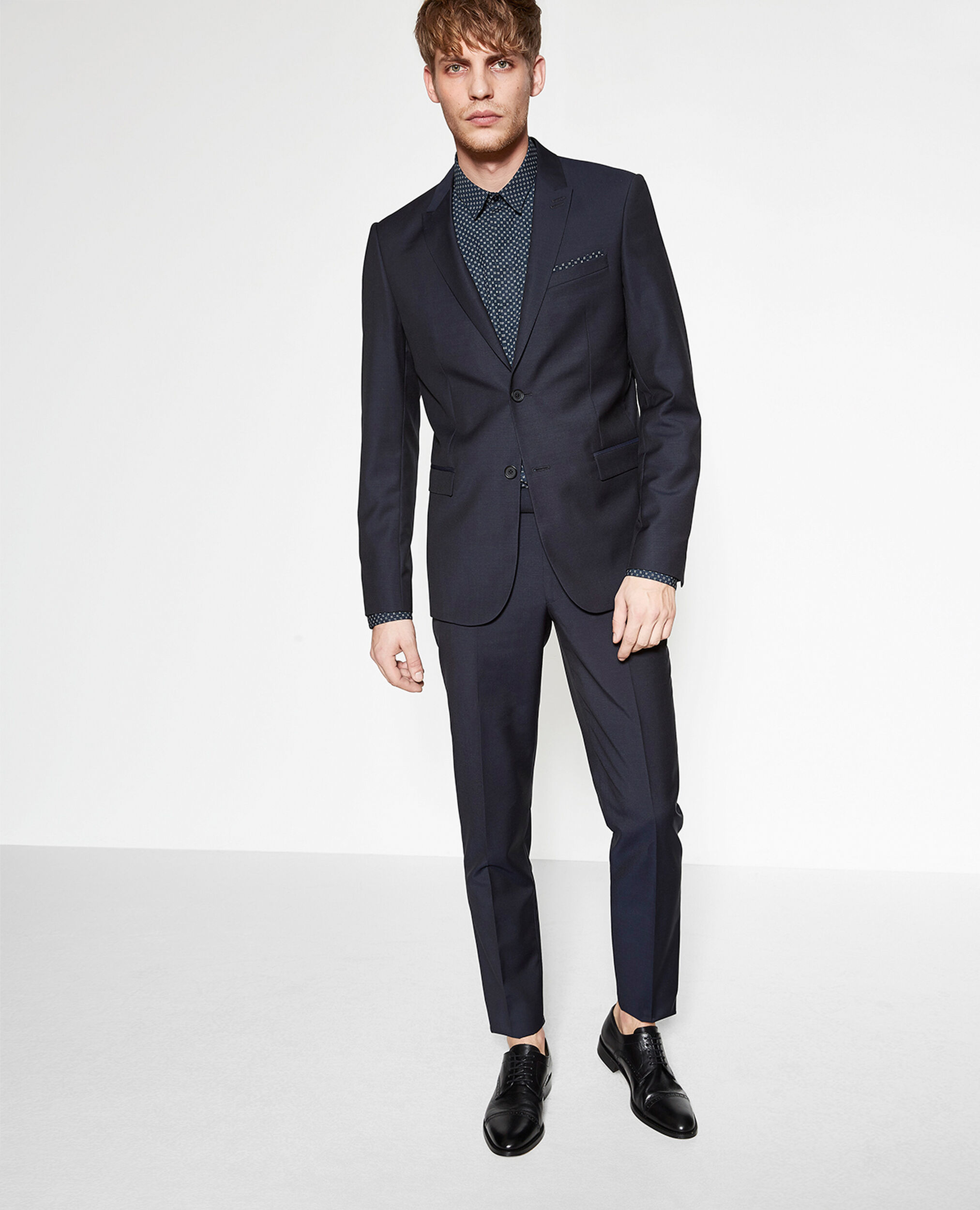 Men’s navy blue suit jacket