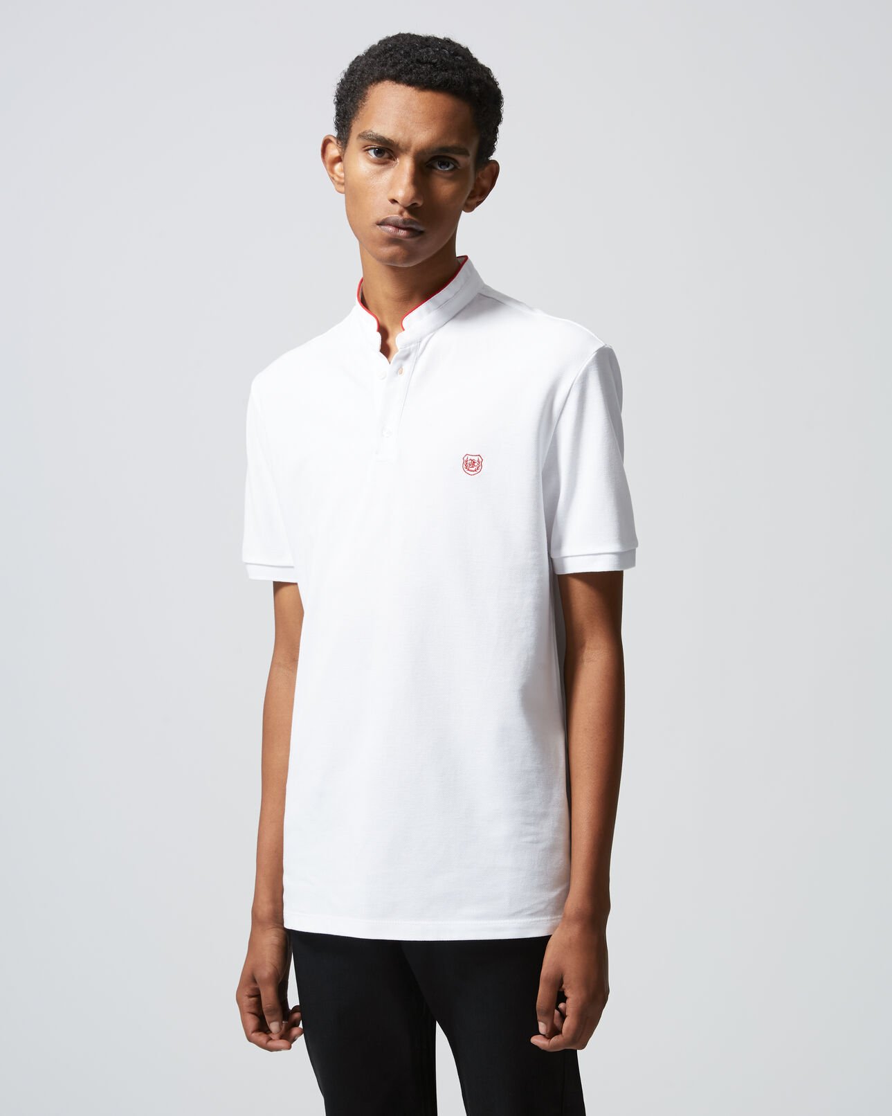 The Kooples HOMME WHITE / FIRED RED polo blanc brodé détails rouge vif