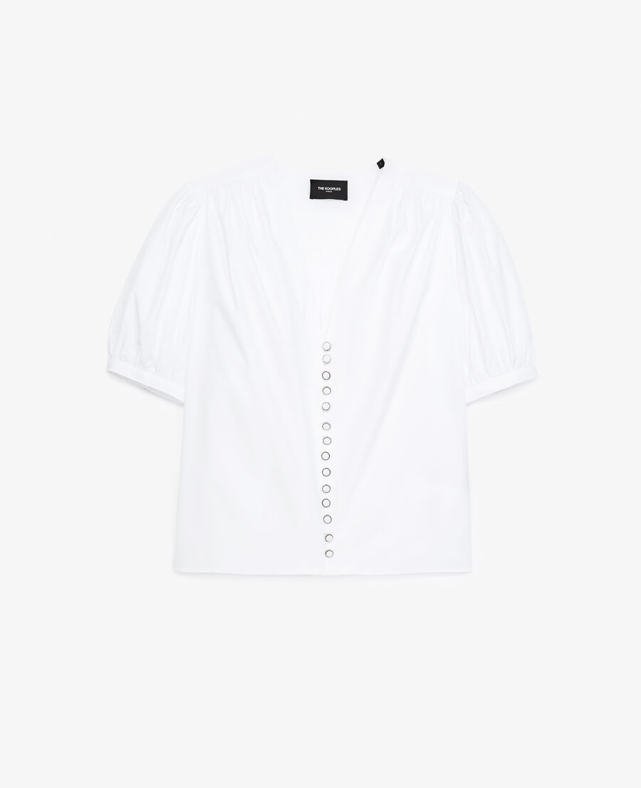 white shirt with v-neck and puffed sleeves