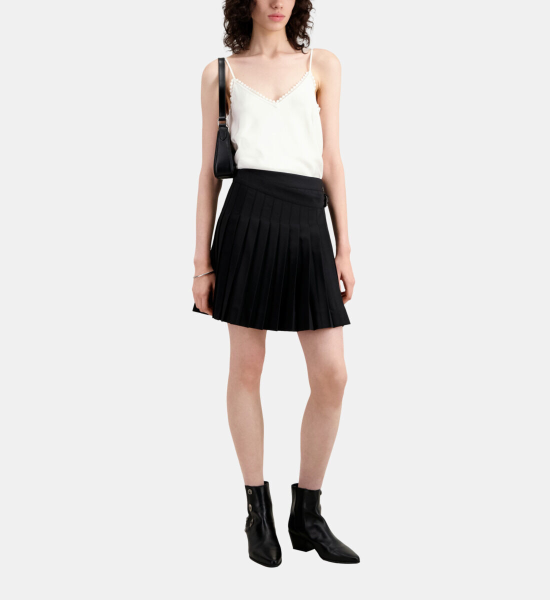 Short black pleated skirt