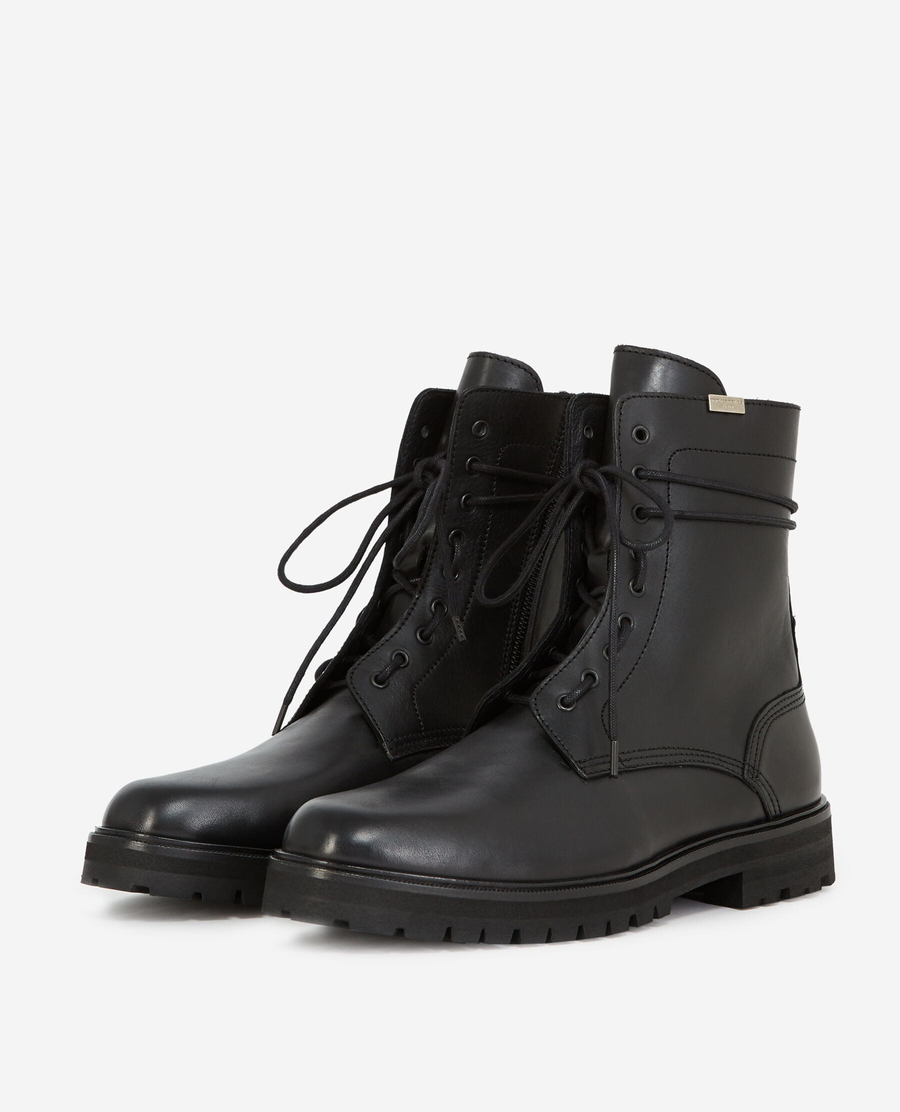 Black boots in leather with side lace detail