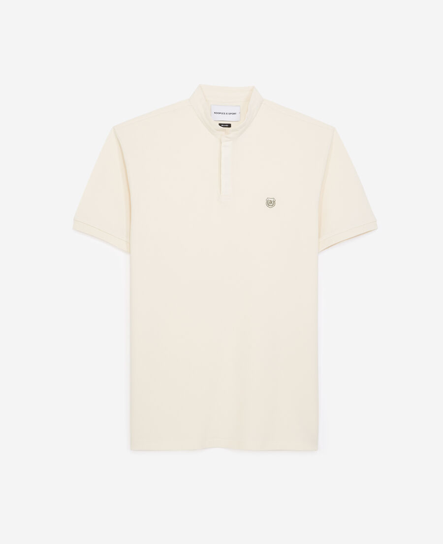 white cotton polo with green piping