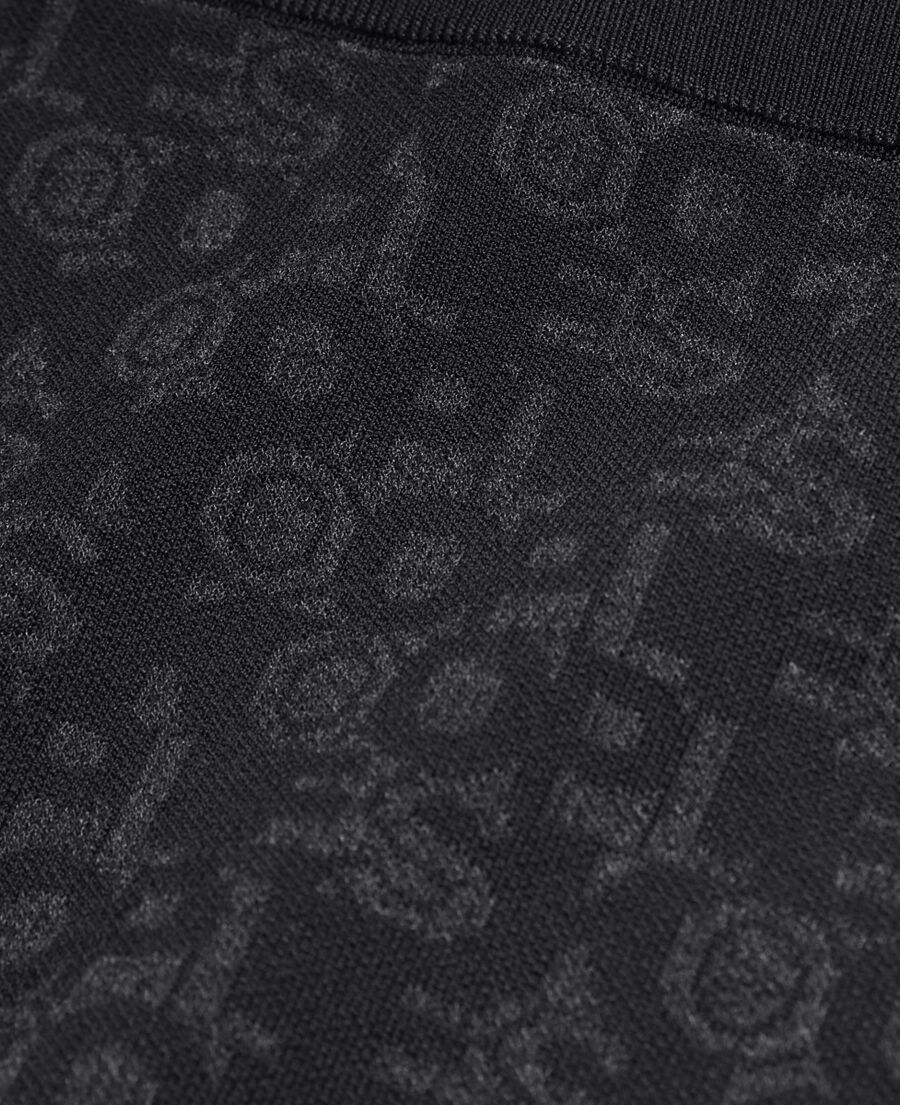 short black skirt with the kooples logo