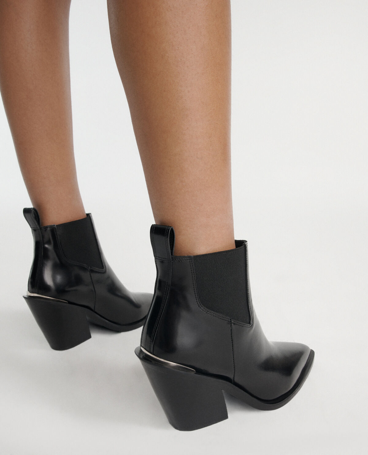 Glossy black leather boots in western style The Kooples