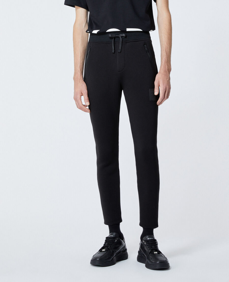 zipped skinny black joggers with logo patch