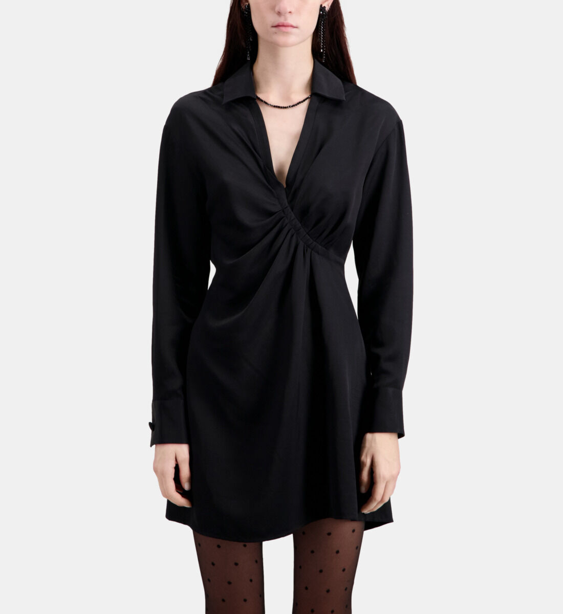 Short black dress with draping, this season's star piece! Discover our  selection of women's ready-to-wear on the website and in store.