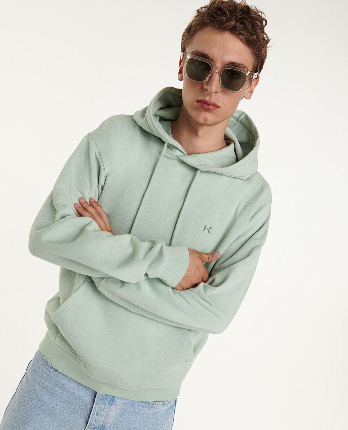 Hooded mint green sweatshirt with rubber logo