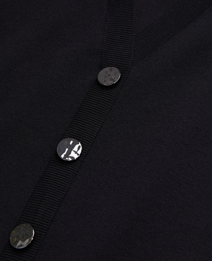pull avec boutonnage dans le dos